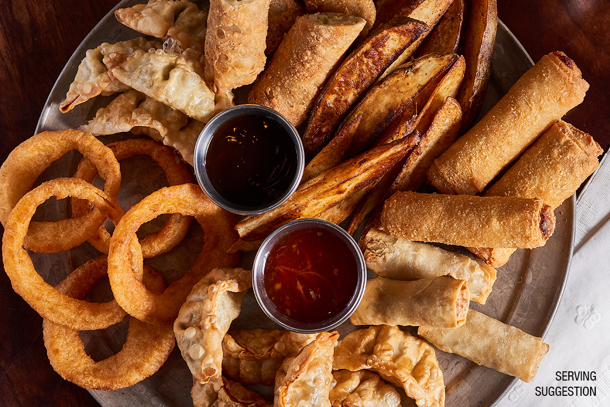 appetizer platter with onion rings, eggrolls, french fries, and fried dumplings