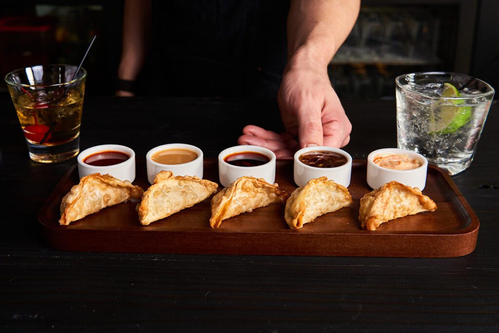 fried dumplings served with a variety of sauces